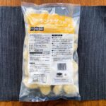 業務スーパーの「チキンナゲット（タイ産）」1kgパッケージを真上から撮影した写真。パッケージ裏面の調理方法や成分表示が見える。